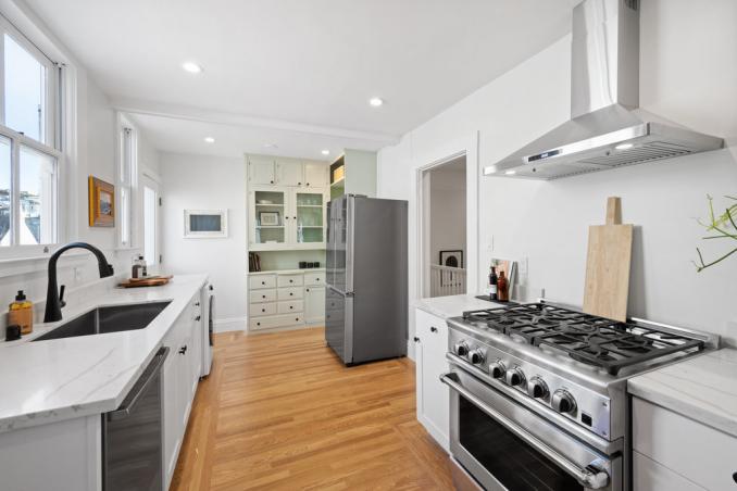 Property Thumbnail: Kitchen has been updated and has stainless steel appliances and wood floors.