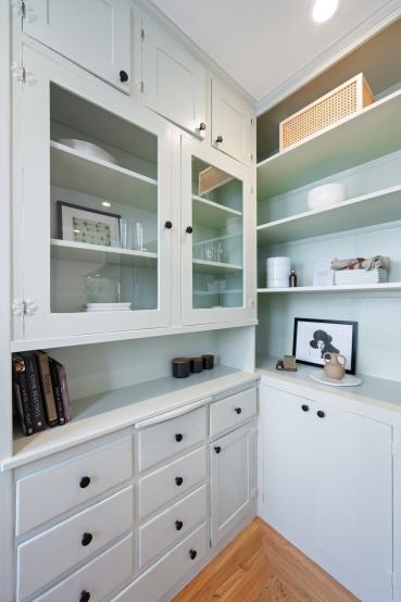 Property Thumbnail: Close up of built in cabinet and it is painted a light mint green for an accent. 