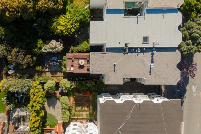 Property Thumbnail: Aerial shot of top of building and yard. 