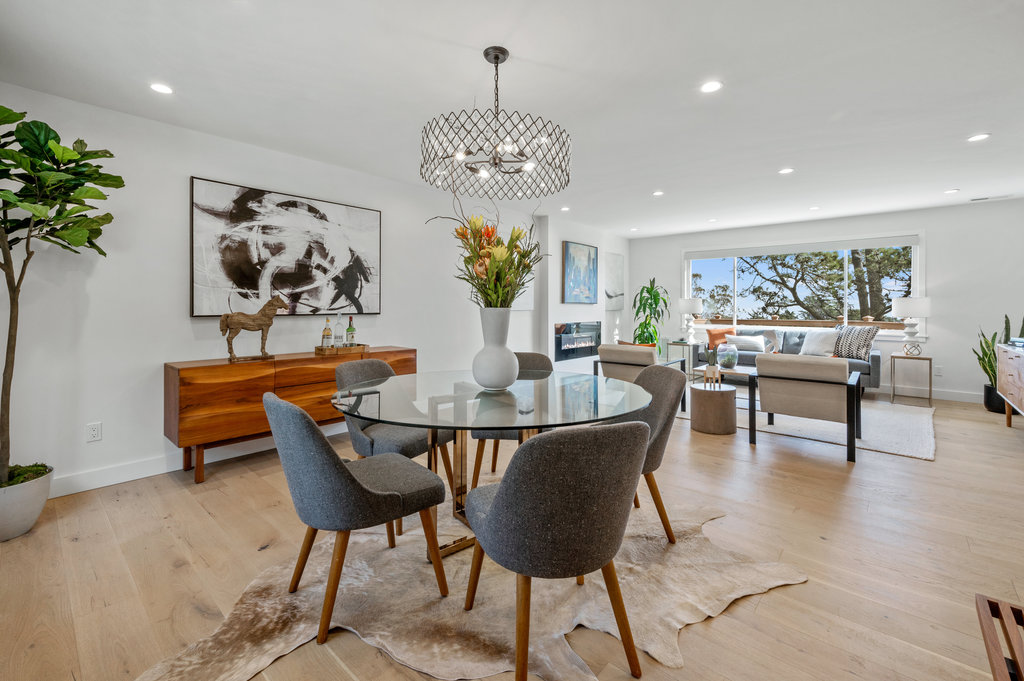 View of the open floor plan and lux dining area at 156 Midcrest Way