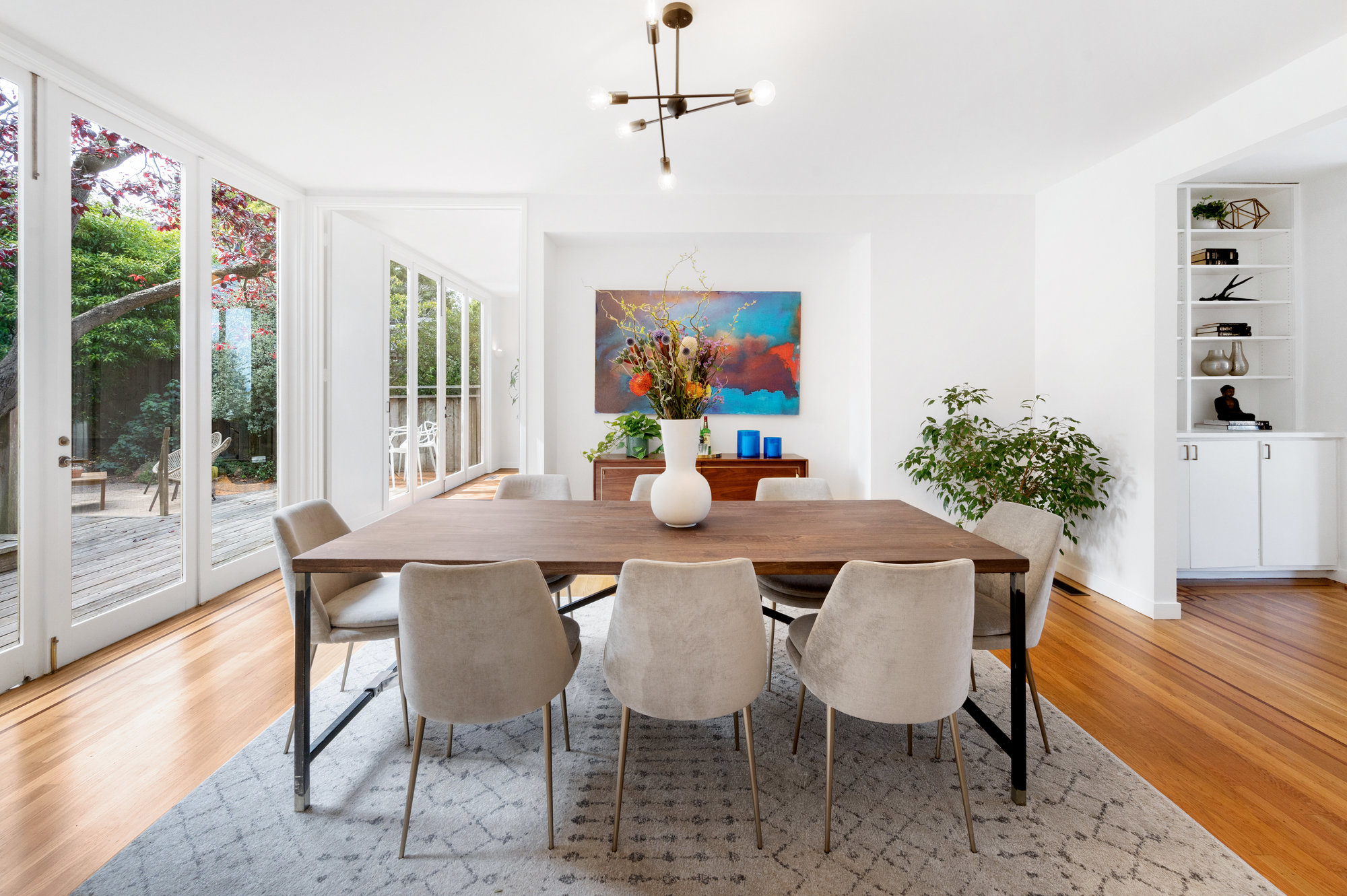 View of the formal dining room with views of the garden beyond