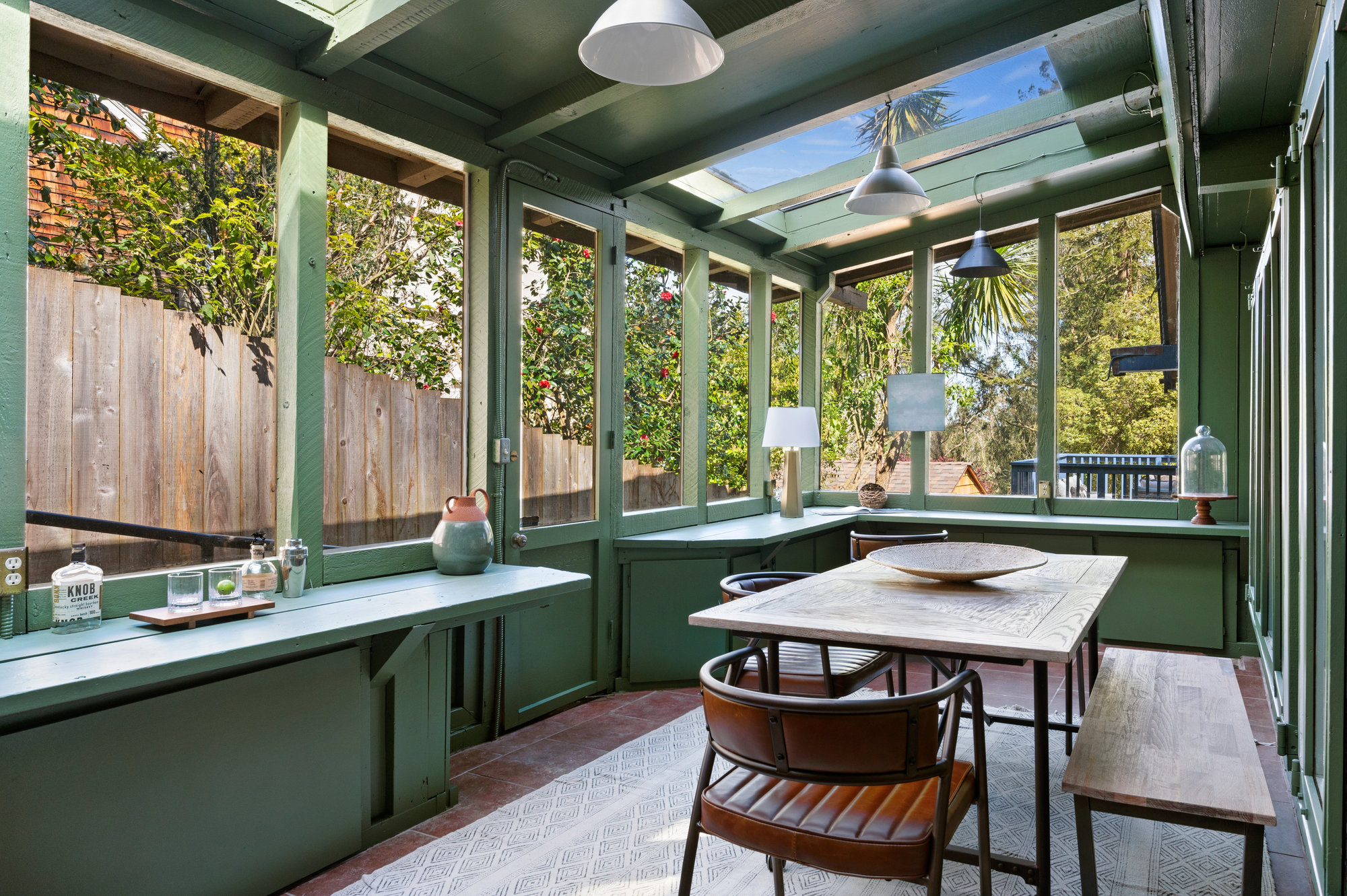 View of the sunroom at 281 Edgewood Ave in Cole Valley, represented by John DiDomenico