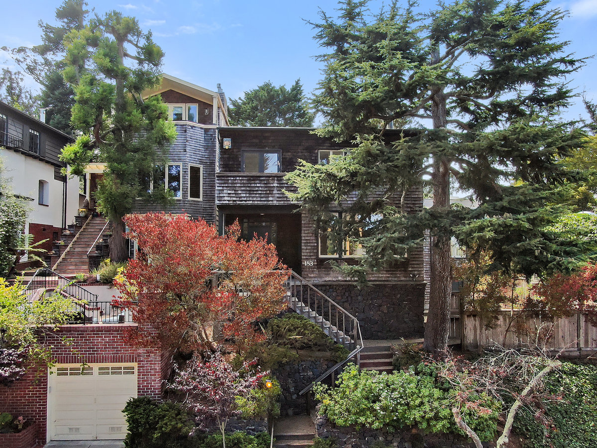 Front exterior view of 183 Edgewood Ave, showing a home with wood shingle facade