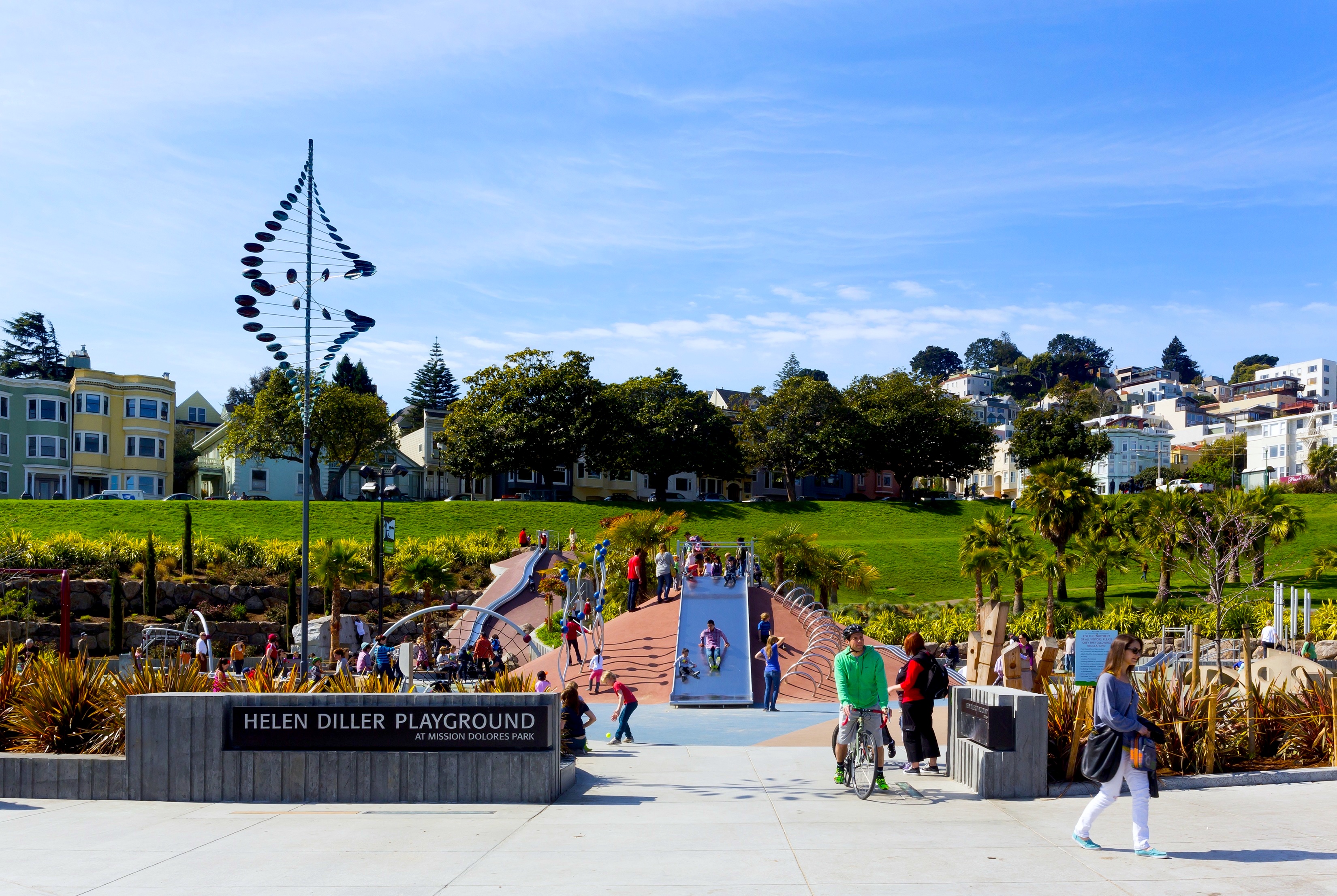 View of Mission Dolores Park showing people playing outside