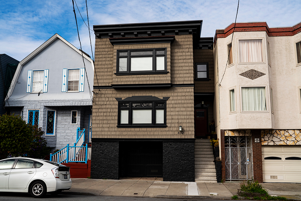 Front exterior view of 432 Lawton, a home with tan shingles 