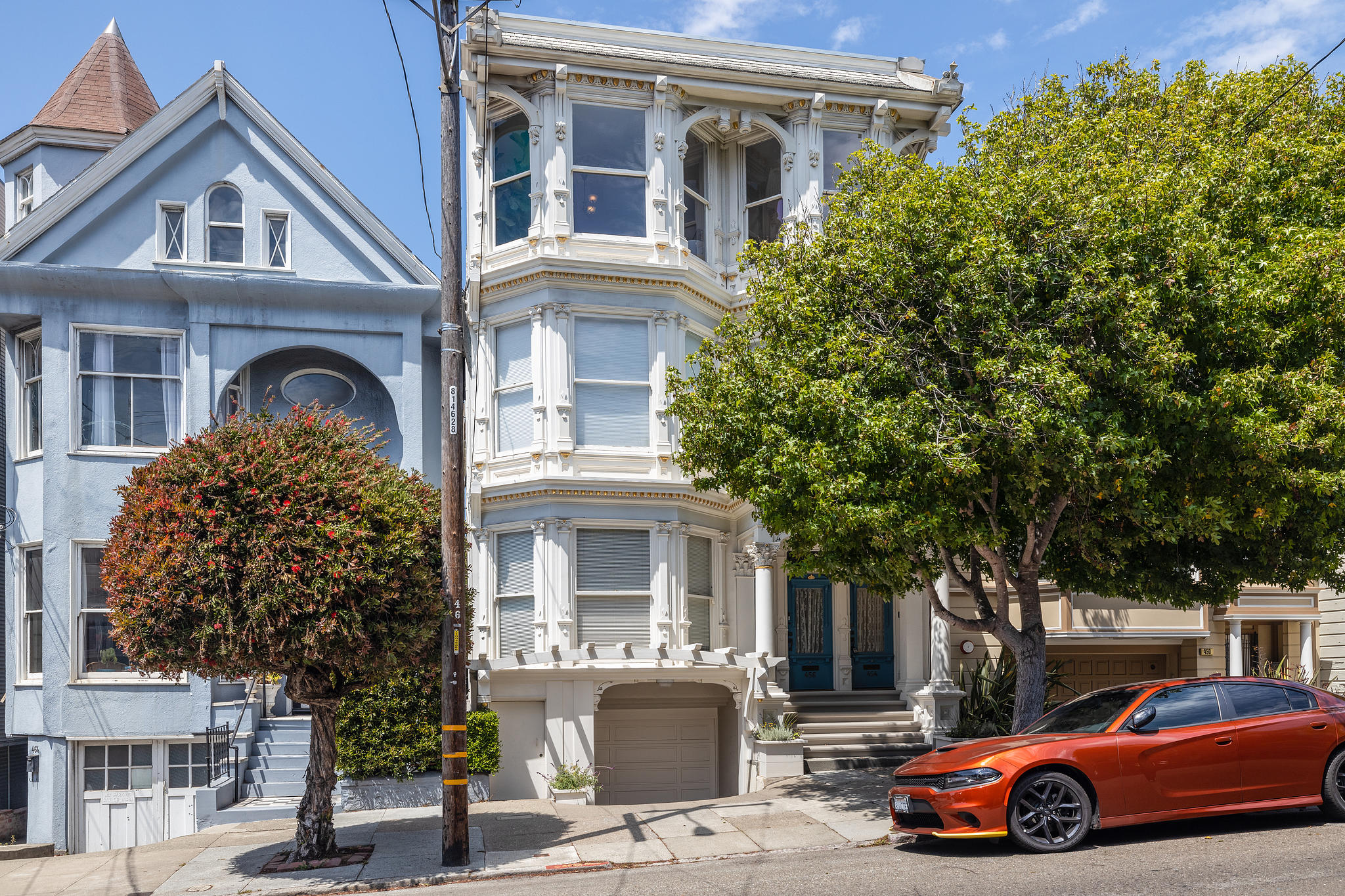 454 Frederick street, featuring a large white house with elegant wood trim