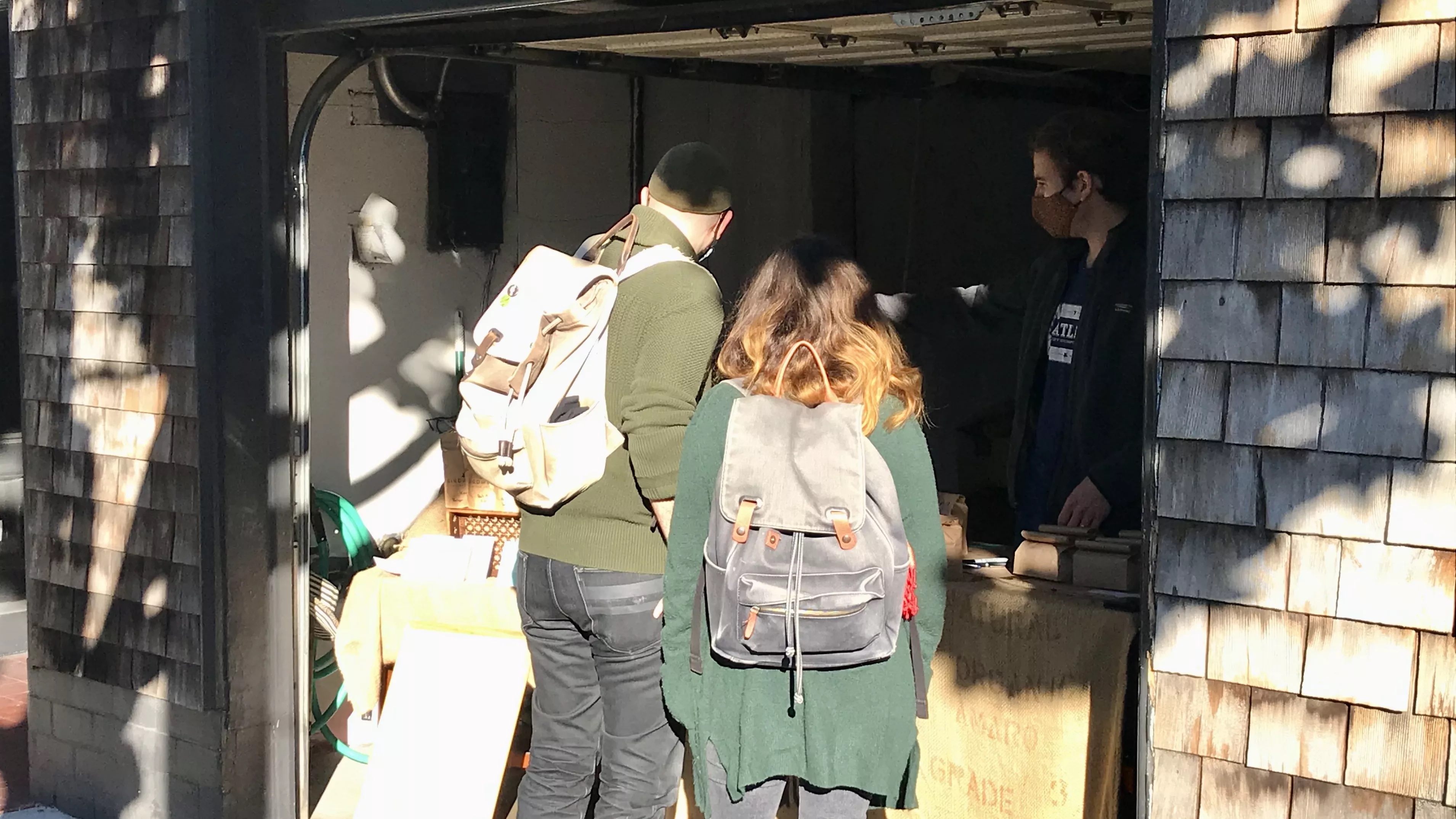 People ordering coffee at Bird and Bear Coffee 