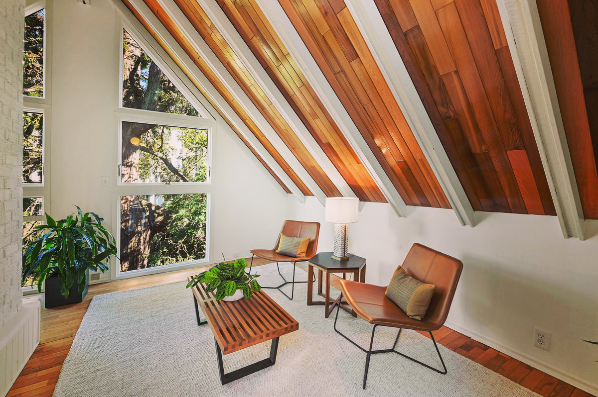 View of a room with wood ceiling and wonderful natural light