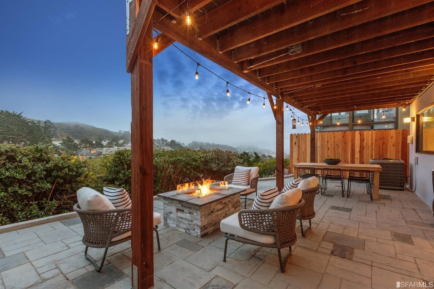 View of the outdoor living area at 42 Clairview, showing a large open room with walkout deck