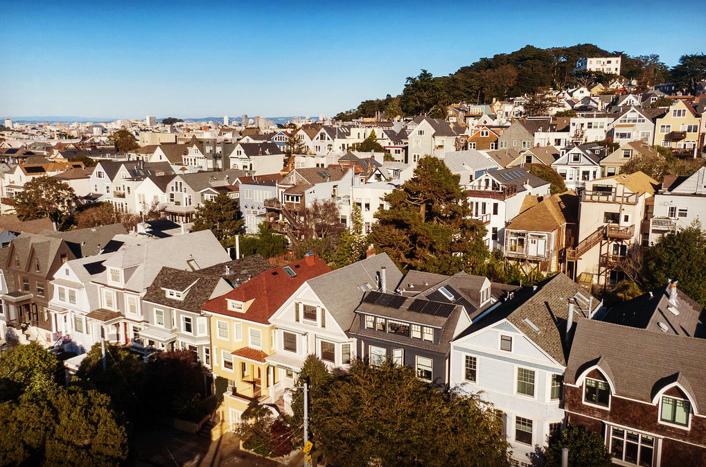 Aerial street view of 856 Clayton, showing a row of Victorian homes