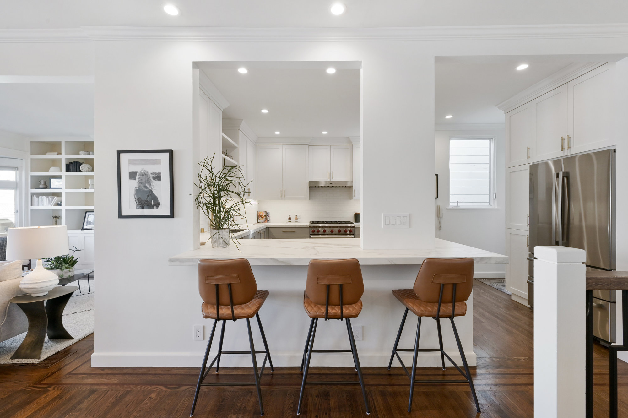 View of the kitchen island with seating