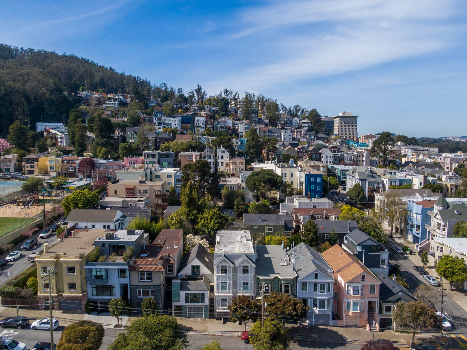 Property Photo: Aerial view of 1223 Shrader Street, showing Cole Valley and San Francisco beyond
