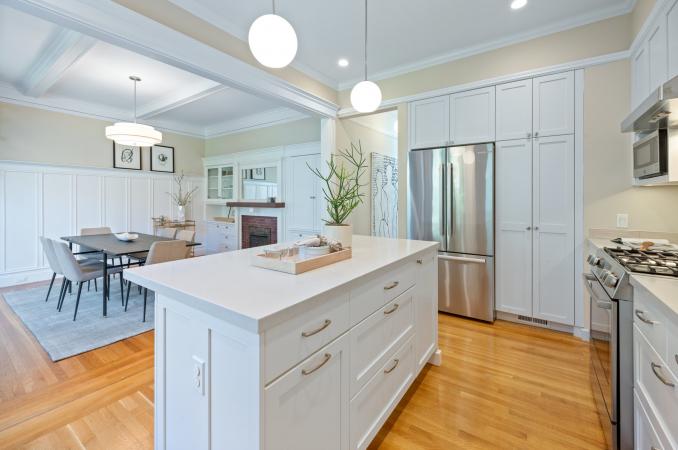 Property Thumbnail: Kitchen has built in cabinets around fridge. All stainless steal appliances. 