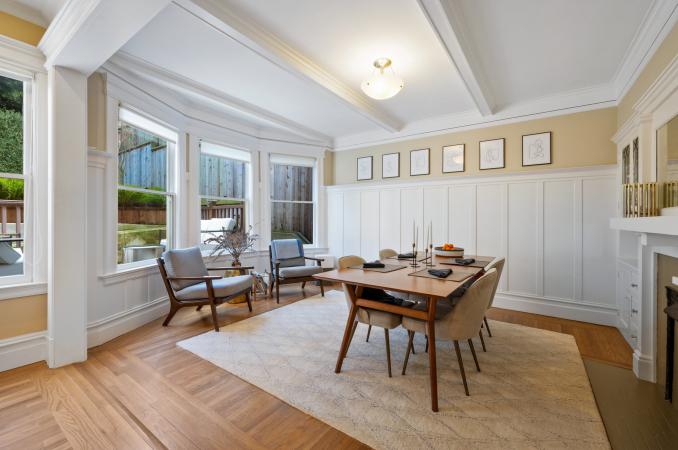 Property Thumbnail: Dining room in lower unit, 638 Belvedere. Beautiful wood detailing, bay windows looking out to backyard. 