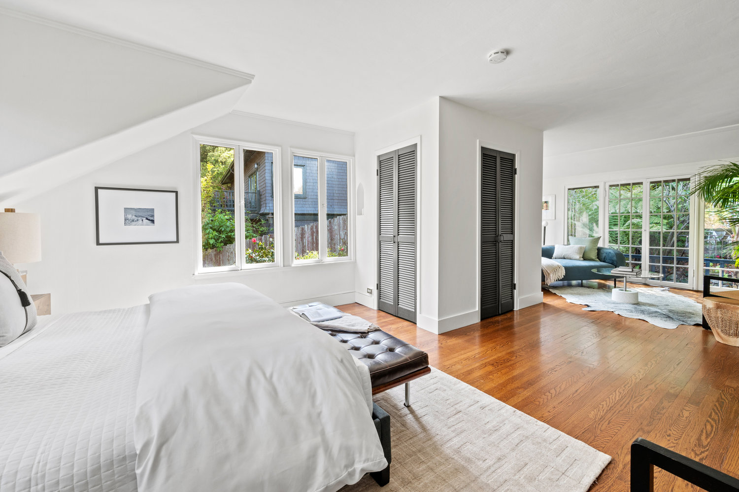 Property Photo: This large bedroom has large sitting area at backside of room. 