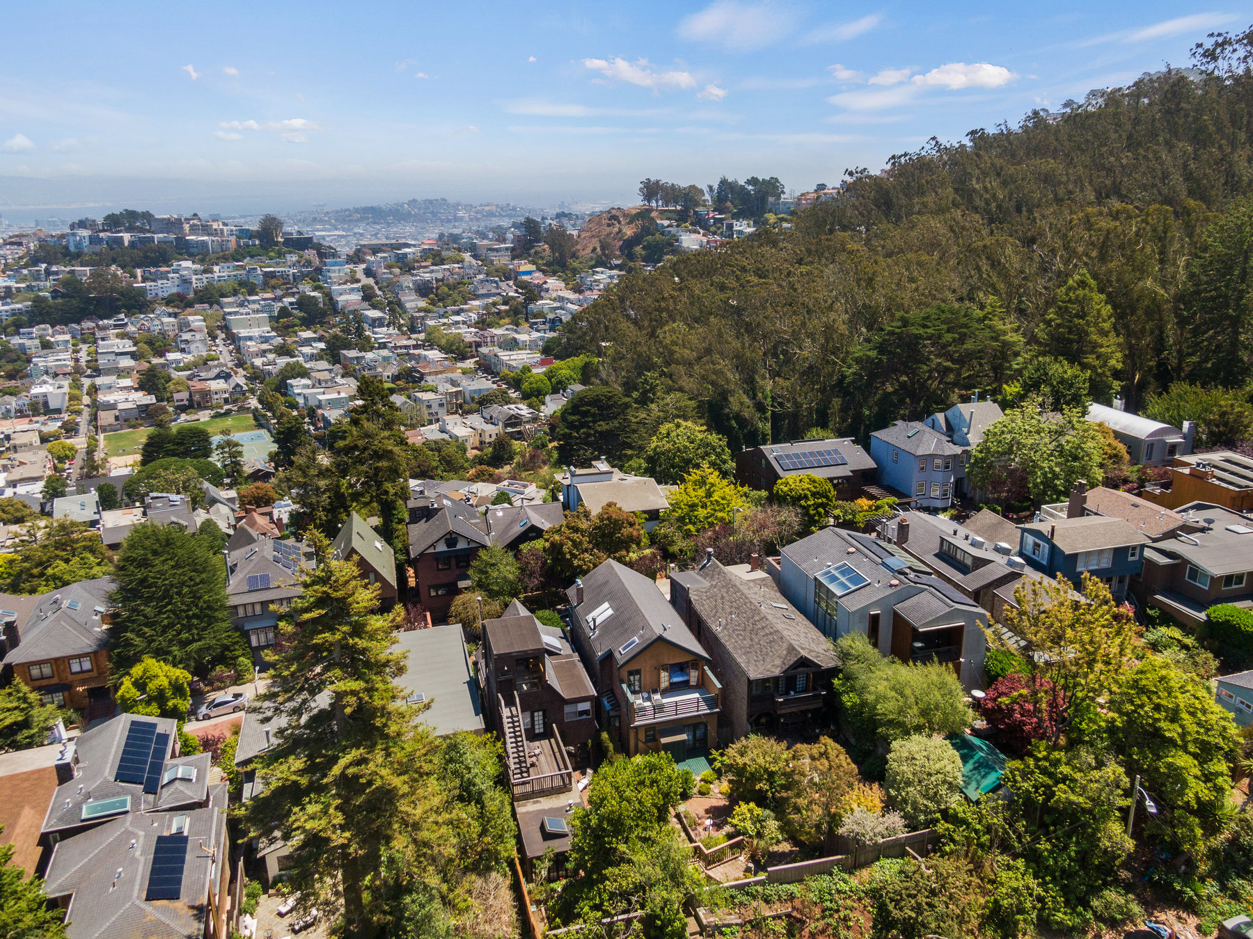Property Photo: View of 205 Edgewood Avenue from above, showing San Francisco Bay