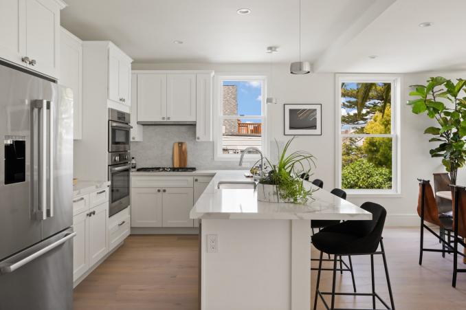 Property Thumbnail: Kitchen has light stone counter tops. 