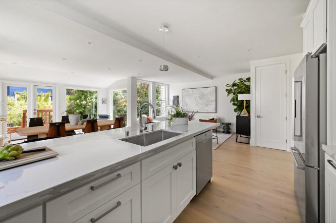 Property Thumbnail: Looking out over the island you can see all the large windows. Lots of greenery. 