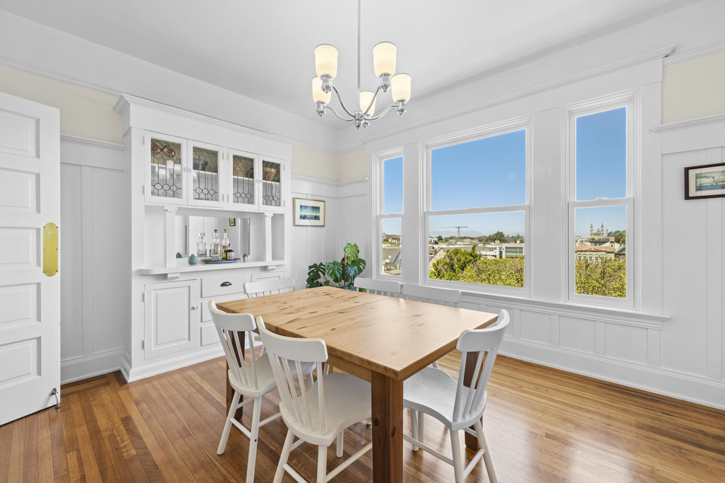 Property Photo: Dining room has large windows with stunning view. Lots of natural light in the room. 
