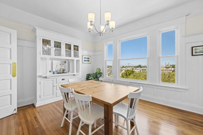 Property Thumbnail: Dining room has large windows with stunning view. Lots of natural light in the room. 
