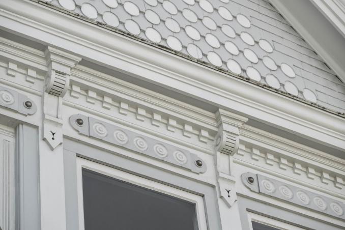 Property Thumbnail: Close up of the details of the facade of home. 