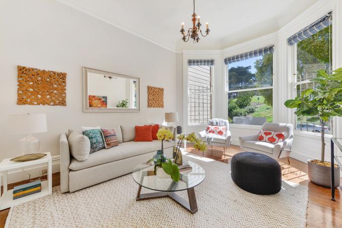 Property Thumbnail: Living room with wood floors and bay window