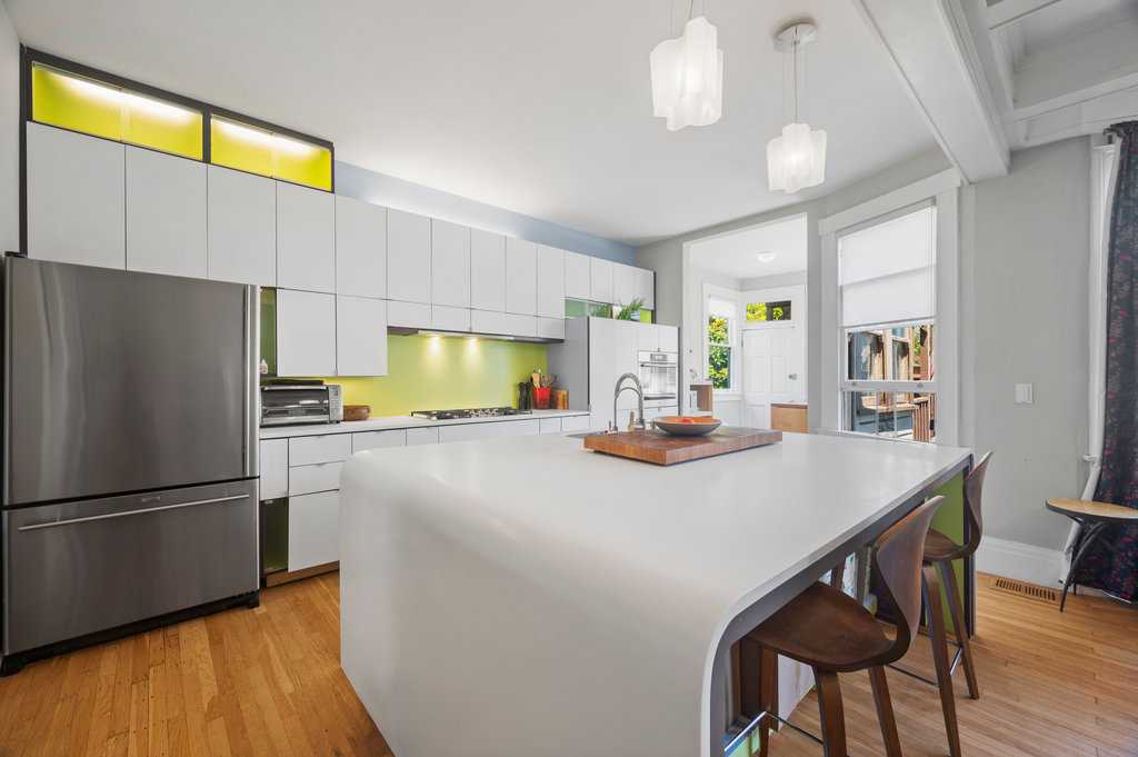 Property Photo: updated kitchen with stainless steel appliances. 