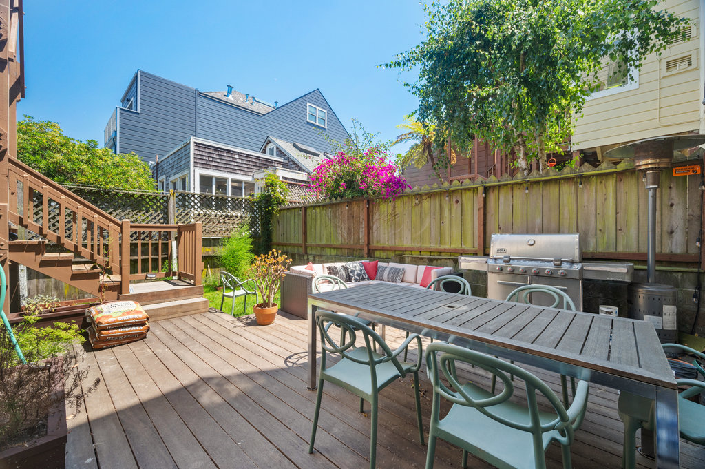 Property Photo: Back yard is shared and is all fenced in. 