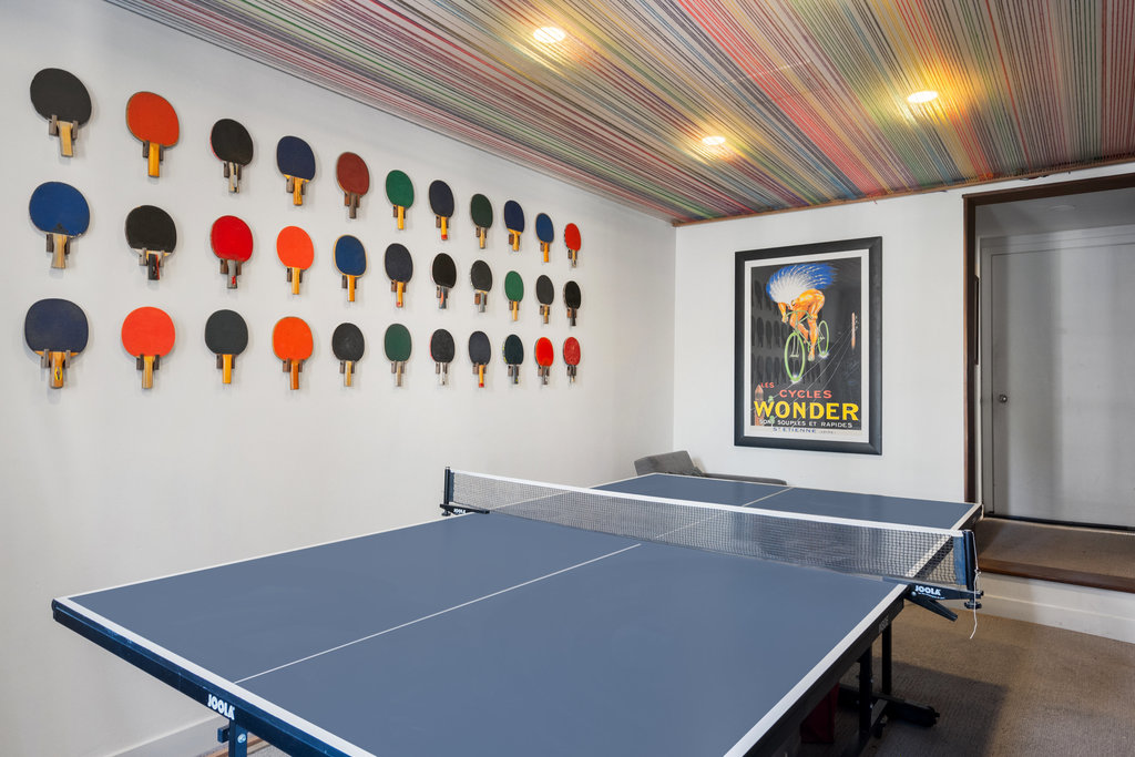 Property Photo: Lower reck room has ping pong table. 