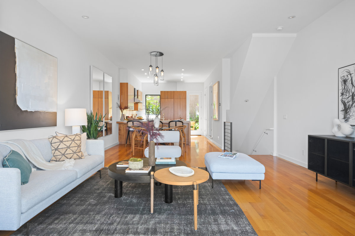 Property Photo: The second level of home is main living space. There is an open floor plan featuring living, dining room, and kitchen.