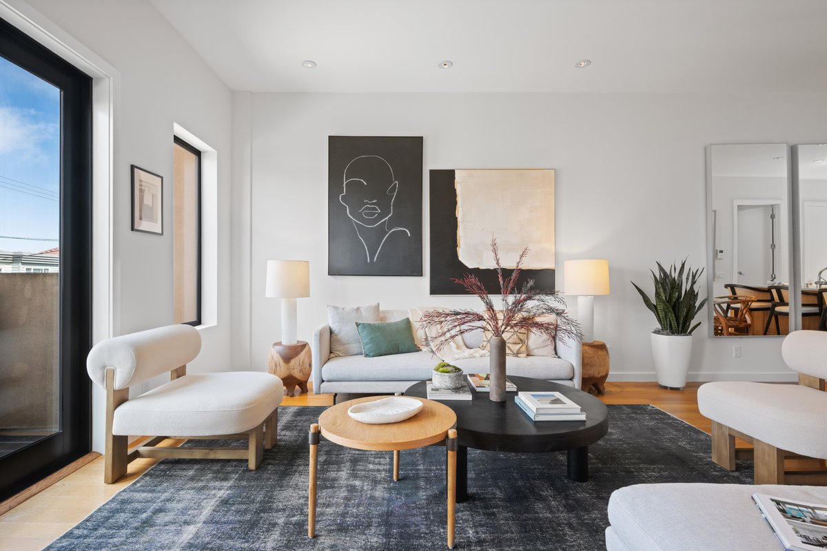 Property Photo: Living room is large with high ceilings and recessed lighting and tons of natural light. 