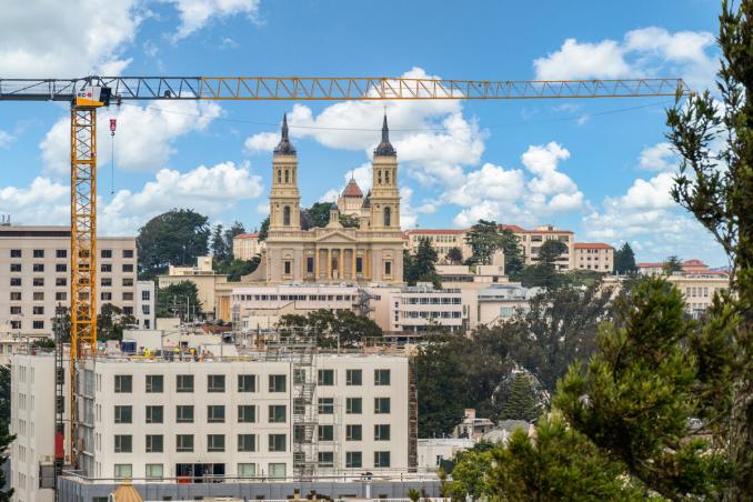 Property Thumbnail: Close up photo of the Vvew of St. Ignatius from the primary bedroom. 