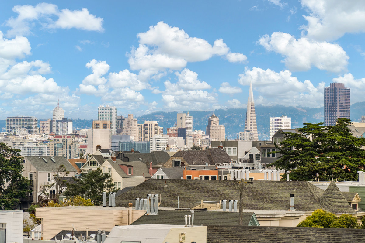 Property Photo: Close up photo of the view of downtown from primary bedroom. 