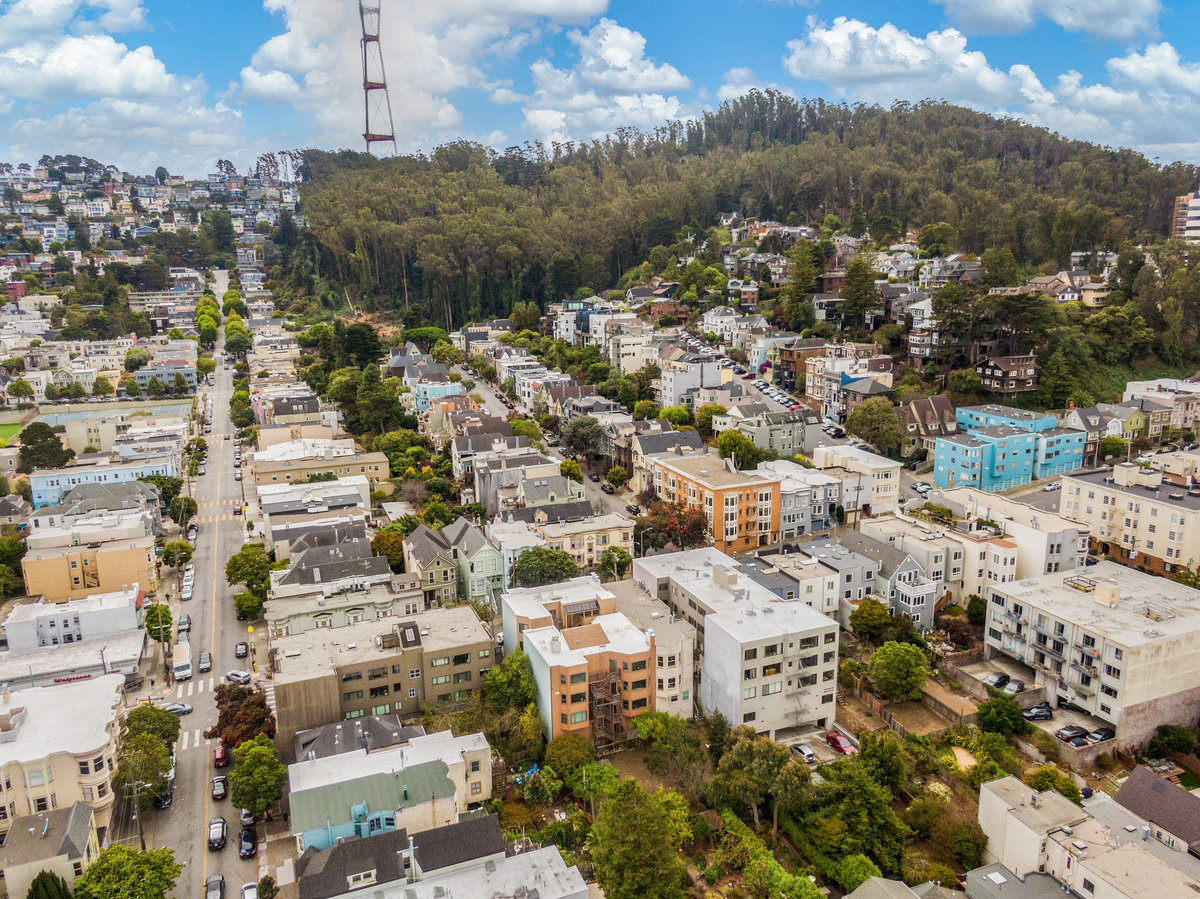 Property Photo: Aerial photo looking up to Twin Peaks and Sutro Forest. 