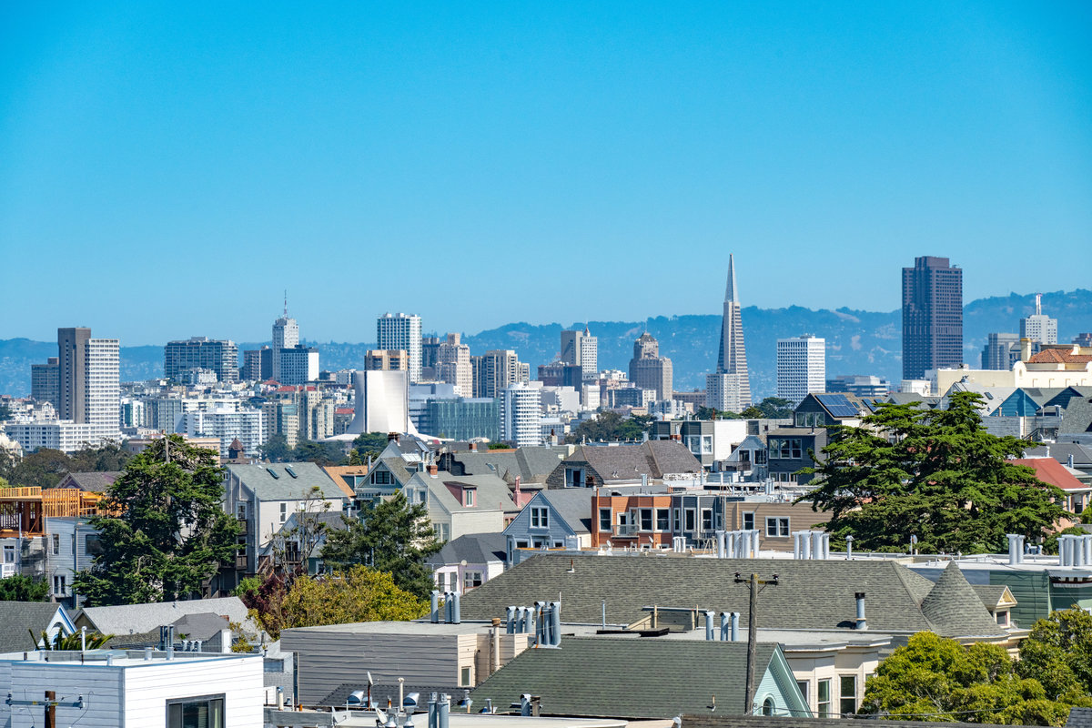 Property Photo: Close up photo of downtown view from the primary bedroom. 