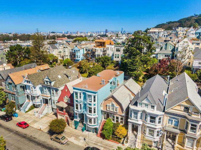 Property Thumbnail: Front exterior of 764 Cole Street and surrounding victorian homes. 