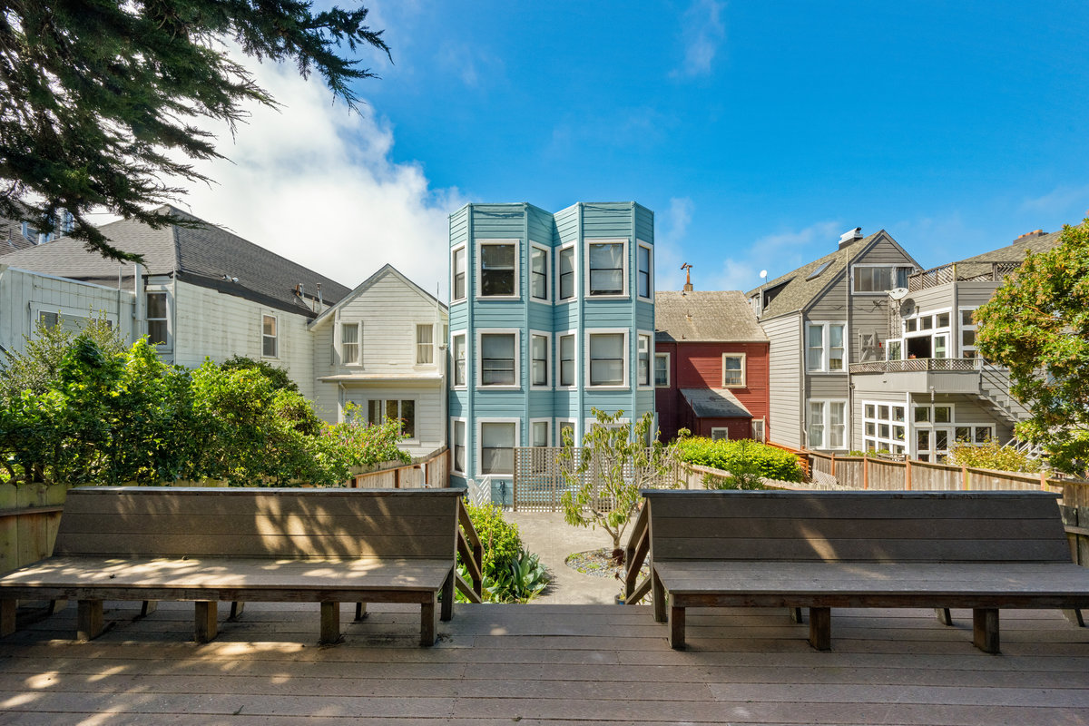 Property Photo: Looking at back exterior of building from the back deck. 