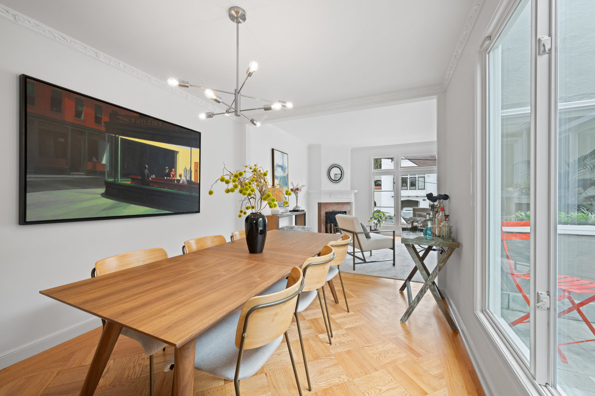 Property Photo: Looking over dining room from breakfast bar.