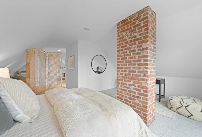 Property Thumbnail: Another photo of upper bedroom space. There is carpet thought out. 