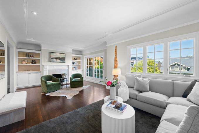 Property Thumbnail: Living room has beautiful windows that let in lots of natural light. 