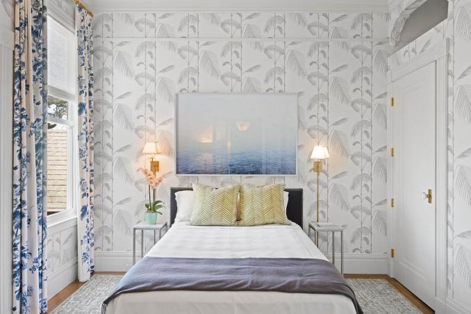 Property Thumbnail: Guest room has beautiful wallpaper and hardwood floors throughout