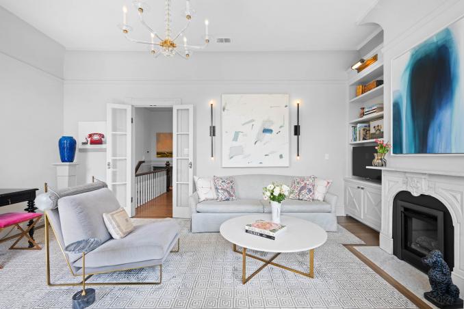 Property Thumbnail: There is french doors that open up into the living room. There are lots of of pretty classic moldings throughout. 