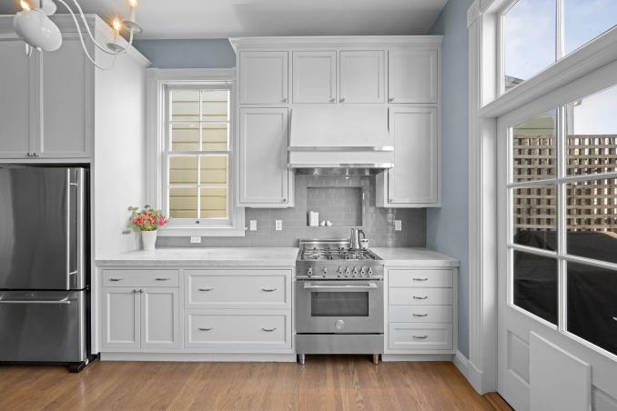 Property Thumbnail: Kitchen has all stainless steel appliances and gas range stove.