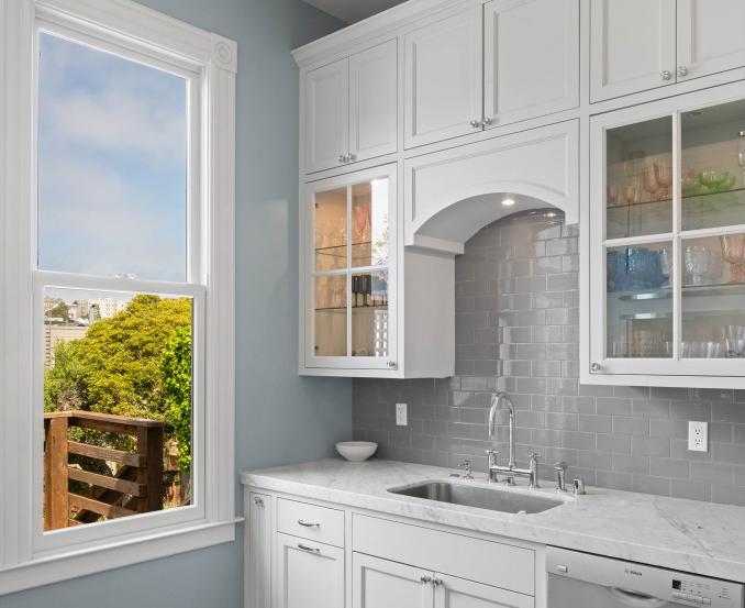 Property Thumbnail: The cabinets next to the sink have beautiful glass doors. 