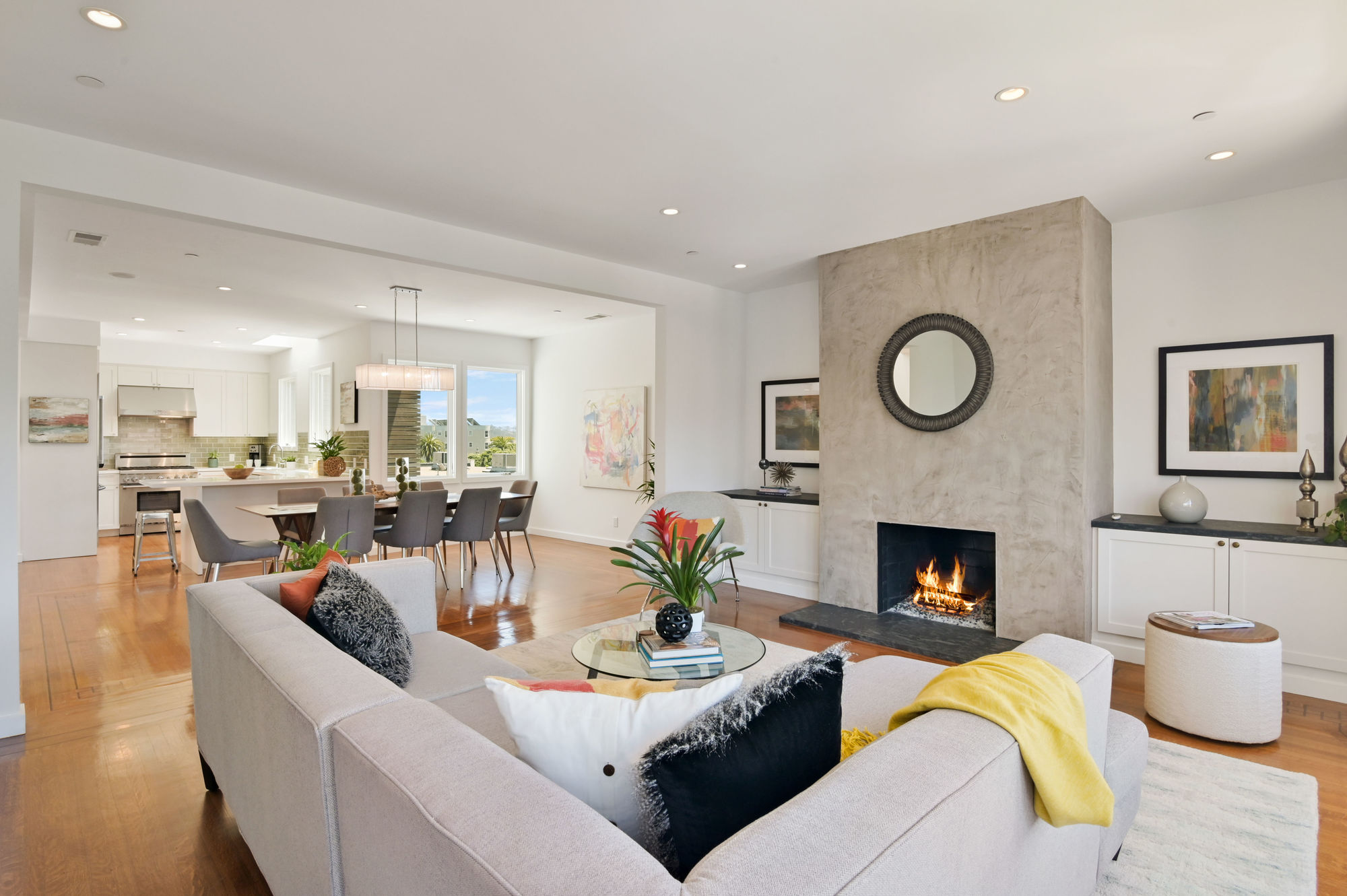 Property Photo: View of a living area, featuring a fireplace 