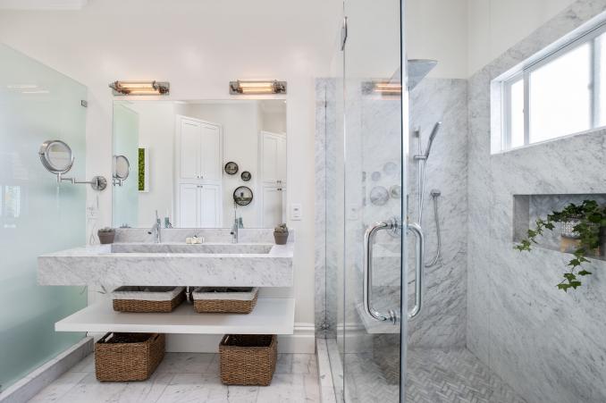Property Thumbnail: View of a luxurious bathroom with marble and a glass shower