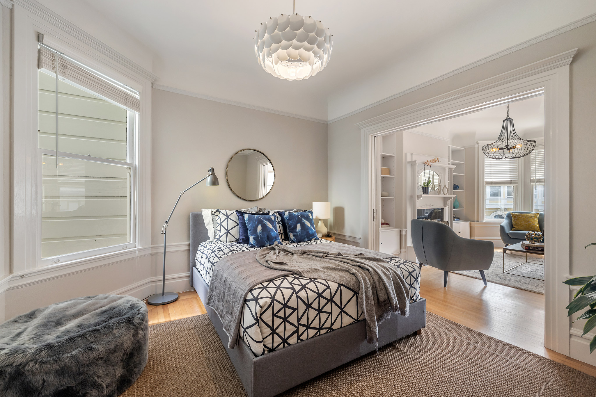 Property Photo: View of a bedroom with glass light fixture