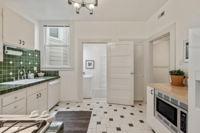 Property Thumbnail: Kitchen, featuring black and white tiled floor