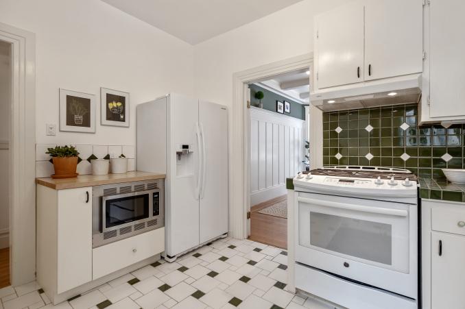 Property Thumbnail: Kitchen stove and fridge 