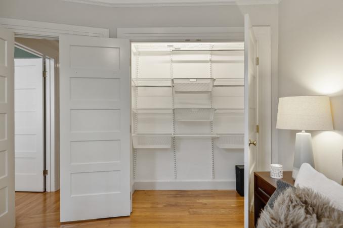 Property Thumbnail: View of a large closet with shelving 